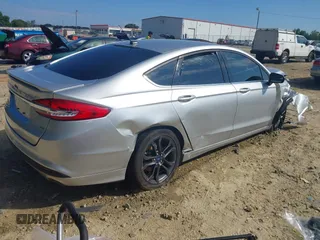2018 Ford Fusion SE with VIN 3FA6P0H79JR237925, listed as a IAAI auction lot 40043643 with 147,919 mi miles. Bid and sale history available at carsss.com. Image 4.