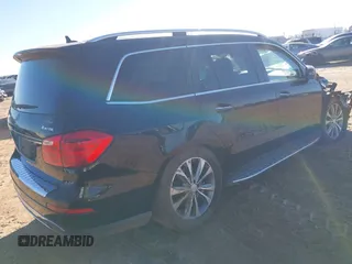 2016 Mercedes-Benz GL with VIN 4JGDF6EE1GA698884, listed as a IAAI auction lot 41320600 with 1 mi miles. Bid and sale history available at carsss.com. Image 4.