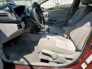 2011 Honda Insight EX z VIN JHMZE2H75BS011216, wystawiony jako Copart lot #60434195 z przebiegiem 108 288 mil mil oraz Szkoda całkowita • Salvage title. Historia ofert i sprzedaży dostępna na DreamBid. Obrazek 7.
