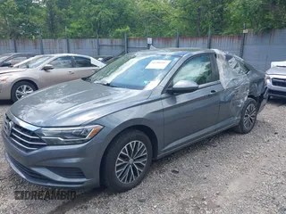 2019 Volkswagen Jetta S z VIN 3VWC57BUXKM121316, wystawiony jako IAAI lot #42290107 z przebiegiem 117 371 mil mil oraz . Historia ofert i sprzedaży dostępna na DreamBid. Obrazek 2.