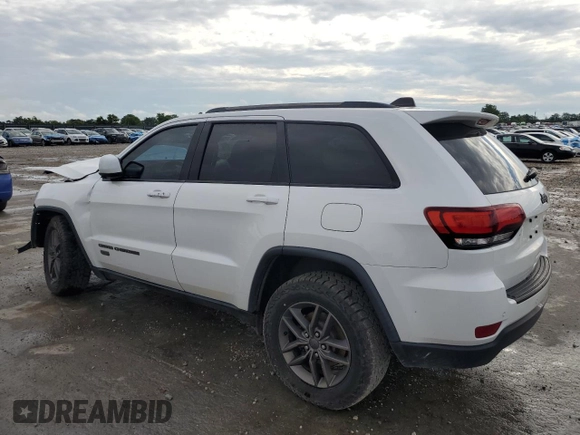 2017 Jeep Grand Cherokee 75th Anniversary with VIN 1C4RJEAG3HC696232, listed as a Copart auction lot 57362055 with 105,440 mi miles and Salvage title. Bid and sale history available at DreamBid. Image 2.