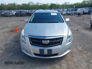 2016 Cadillac XTS Luxury Collection z VIN 2G61M5S33G9107107, wystawiony jako IAAI lot #42072608 z przebiegiem 130 542 mil mil oraz . Historia ofert i sprzedaży dostępna na DreamBid. Obrazek 12.