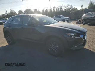 2025 Mazda CX-30 S with VIN 3MVDMBAM5SM751984, listed as a Copart auction lot 43232255 with 2,448 mi miles and Salvage title. Bid and sale history available at DreamBid. Image 4.