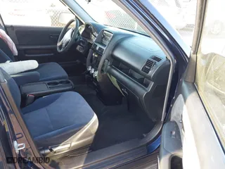 2006 Honda CR-V EX with VIN JHLRD788X6C011242, listed as a IAAI auction lot 41714756 with 199,074 mi miles. Bid and sale history available at carsss.com. Image 5.