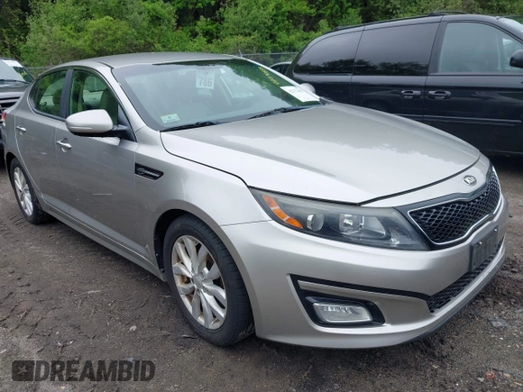 2014 Kia Optima EX z VIN 5XXGN4A70EG335090, wystawiony jako IAAI lot #42272655 z przebiegiem 165 795 mil mil oraz . Historia ofert i sprzedaży dostępna na DreamBid. Obrazek 1.