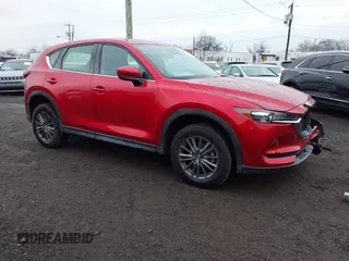 2019 Mazda CX-5 Sport with VIN JM3KFBBM7K1574764, listed as a IAAI auction lot 41276424 with 28,901 mi miles and . Bid and sale history available at carsss.com. Image 1.