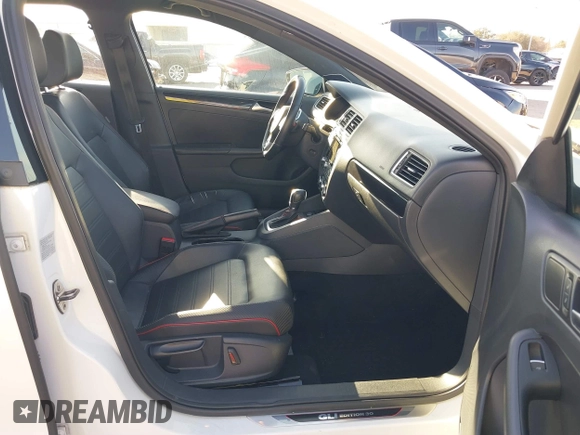 2014 Volkswagen Jetta GLI Edition 30 z VIN 3VW4S7AJ3EM278162, wystawiony jako IAAI lot #41649711 z przebiegiem 136 402 mil mil oraz . Historia ofert i sprzedaży dostępna na DreamBid. Obrazek 5.