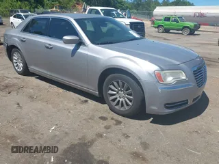 2014 Chrysler 300 z VIN 2C3CCAAG4EH379971, wystawiony jako IAAI lot #42314659 z przebiegiem 162 735 mil mil oraz . Historia ofert i sprzedaży dostępna na DreamBid. Obrazek 1.