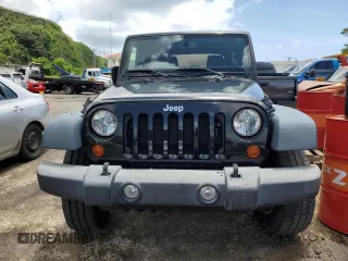 2018 Jeep Wrangler JK Unlimited Sport S with VIN 1C4BJWDG4JL911089, listed as a Copart auction lot 56634913 with 0 mi miles and Non Repairable. Bid and sale history available at carsss.com. Image 5.