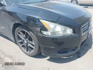 2014 Nissan Maxima S with VIN 1N4AA5AP8EC469519, listed as a IAAI auction lot 42180940 with 119,966 mi miles and . Bid and sale history available at DreamBid. Image 6.