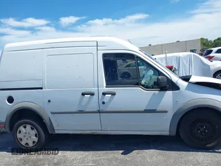 2010 Ford Transit Connect XL z VIN NM0LS7AN5AT016296, wystawiony jako IAAI lot #42597011 z przebiegiem 175 895 mil mil oraz . Historia ofert i sprzedaży dostępna na DreamBid. Obrazek 13.