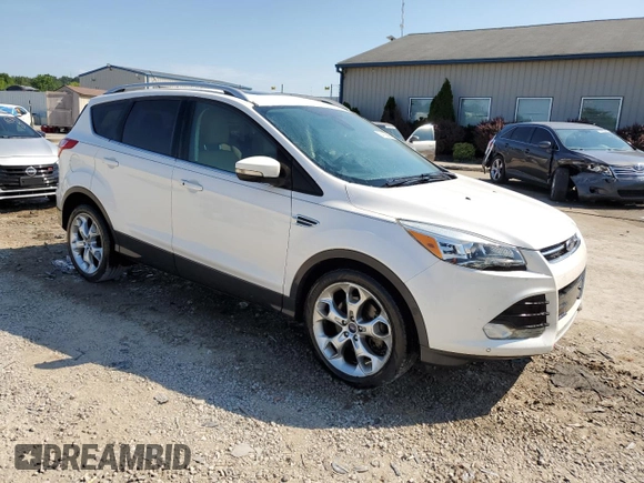 2015 Ford Escape Titanium with VIN 1FMCU0J93FUA58325, listed as a Copart auction lot 64135685 with 126,356 mi miles and Salvage title. Bid and sale history available at DreamBid. Image 4.
