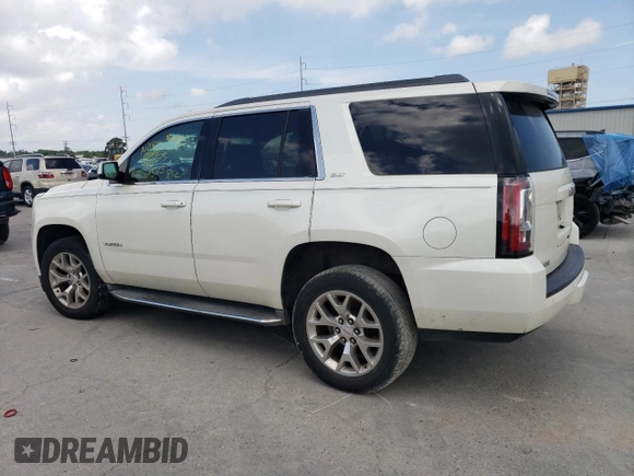 2015 GMC Yukon SLT z VIN 1GKS1BKC4FR552523, wystawiony jako Copart lot #54658135 z przebiegiem 93 907 mil mil oraz Czysty tytuł • Clean title. Historia ofert i sprzedaży dostępna na DreamBid. Obrazek 2.