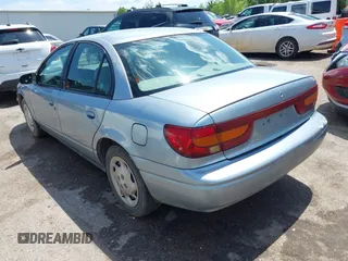 2002 Saturn SL z VIN 1G8ZK52732Z152274, wystawiony jako IAAI lot #42103737 z przebiegiem 56 781 mil mil oraz . Historia ofert i sprzedaży dostępna na DreamBid. Obrazek 3.