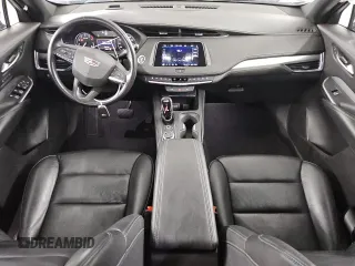 2023 Cadillac XT4 AWD Premium Luxury z VIN 1GYFZDR42PF174473, wystawiony jako Copart lot #55953305 z przebiegiem 42 268 mil mil oraz Szkoda całkowita • Salvage title. Historia ofert i sprzedaży dostępna na DreamBid. Obrazek 8.