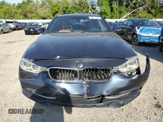2017 BMW 3 Series 330i xDrive with VIN WBA8D9C38HA005368, listed as a Copart auction lot 52611265 with 106,972 mi miles and Salvage title. Bid and sale history available at DreamBid. Image 5.