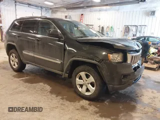 2011 Jeep Grand Cherokee Laredo z VIN 1J4RR4GG1BC541660, wystawiony jako IAAI lot #41340889 z przebiegiem 130 850 mil mil oraz . Historia ofert i sprzedaży dostępna na DreamBid. Obrazek 1.