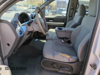 2007 Ford F-150 XLT with VIN 1FTRW12W37KD07142, listed as a Copart auction lot 61677585 with 193,758 mi miles and Clean title. Bid and sale history available at DreamBid. Image 7.
