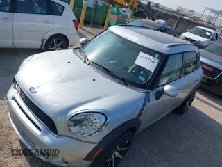 2013 MINI Countryman S z VIN WMWZC3C59DWP22638, wystawiony jako IAAI lot #42327540 z przebiegiem 155 060 mil mil oraz . Historia ofert i sprzedaży dostępna na DreamBid. Obrazek 6.