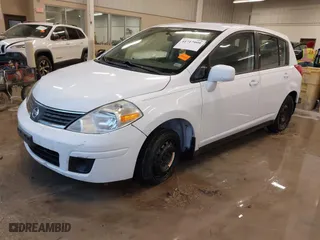 2009 Nissan Versa 1.8 S with VIN 3N1BC13E69L386083, listed as a IAAI auction lot 41717999 with 99,511 mi miles. Bid and sale history available at carsss.com. Image 2.