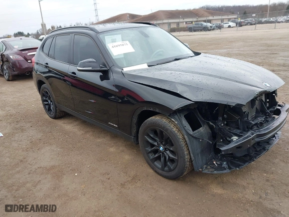 2015 BMW X1 xDrive28i with VIN WBAVL1C57FVY28856, listed as a IAAI auction lot 41695075 with 96,264 mi miles. Bid and sale history available at carsss.com. Image 1.