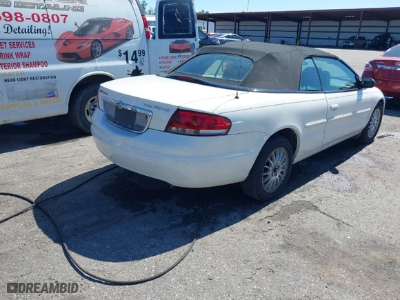 2006 Chrysler Sebring Conv Touring with VIN 1C3EL55R86N135731, listed as a IAAI auction lot 41693953 with 170,628 mi miles. Bid and sale history available at carsss.com. Image 4.