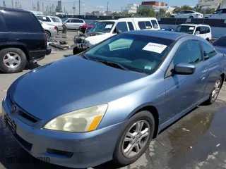 2007 Honda Accord Cpe EX-L with VIN 1HGCM726X7A011282, listed as a IAAI auction lot 41953322 with 176,464 mi miles. Bid and sale history available at carsss.com. Image 6.
