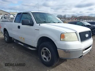 2006 Ford F-150 STX with VIN 1FTRX14W86NB32815, listed as a IAAI auction lot 41909527 with 310,653 mi miles. Bid and sale history available at carsss.com. Image 1.