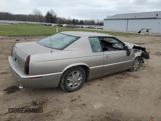 2000 Cadillac Eldorado with VIN 1G6EL12Y5YU166723, listed as a Copart auction lot 82612034 with 80,839 mi miles and Salvage title. Bid and sale history available at DreamBid. Image 3.
