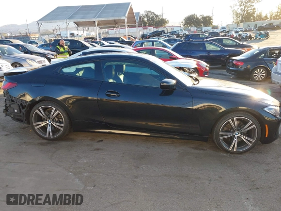2022 BMW 4 Series 430i with VIN WBA53AP03NCK93131, listed as a IAAI auction lot 41349992 with 15,346 mi miles and . Bid and sale history available at carsss.com. Image 14.