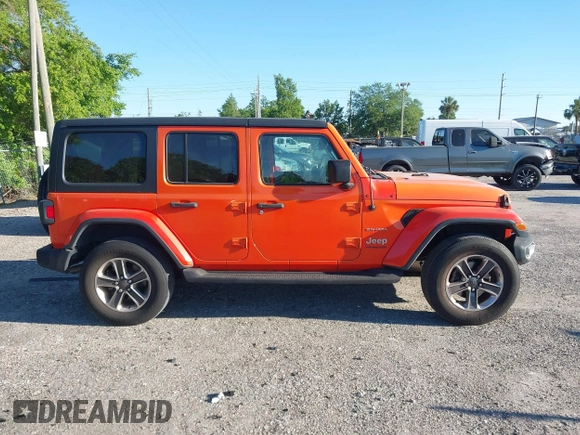2018 Jeep Wrangler Unlimited Sahara with VIN 1C4HJXEG3JW323634, listed as a IAAI auction lot 41853471 with 126,531 mi miles. Bid and sale history available at carsss.com. Image 13.