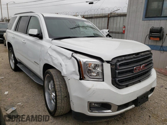 2017 GMC Yukon SLT with VIN 1GKS2BKC9HR125757, listed as a Copart auction lot 73427934 with 72,333 mi miles and Salvage Title. Bid and sale history available at carsss.com. Image 4.