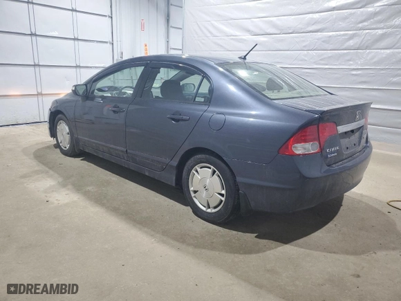 2010 Honda Civic Hybrid with VIN JHMFA3F27AS000535, listed as a Copart auction lot 46923655 with 75,344 mi miles and Salvage Title. Bid and sale history available at carsss.com. Image 2.