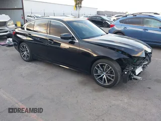 2021 BMW 3 Series 330i with VIN 3MW5R1J07M8B47179, listed as a IAAI auction lot 41450153 with 66,689 mi miles. Bid and sale history available at carsss.com. Image 1.