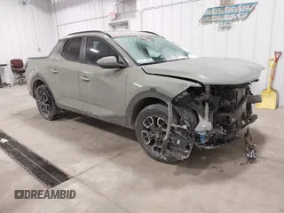 2023 Hyundai Santa Cruz SEL Premium z VIN 5NTJDDAF5PH052824, wystawiony jako IAAI lot #41599885 z przebiegiem 33 281 mil mil oraz . Historia ofert i sprzedaży dostępna na DreamBid. Obrazek 1.