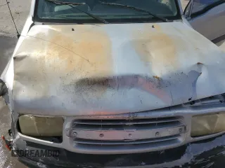 2003 Chevrolet Tracker with VIN 2CNBE13C836953178, listed as a Copart auction lot 60715605 with 128,978 mi miles and Salvage title. Bid and sale history available at DreamBid. Image 12.