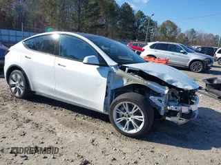 2023 Tesla Model Y Long Range with VIN 7SAYGAEE1PF828338, listed as a IAAI auction lot 40978725 with Not Provided miles and . Bid and sale history available at DreamBid. Image 1.