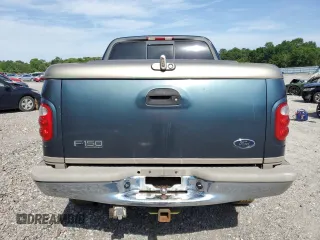 2001 Ford F-150 XLT z VIN 1FTRW08L21KB37421, wystawiony jako Copart lot #57114015 z przebiegiem 288 942 mil mil oraz Szkoda całkowita • Salvage title. Historia ofert i sprzedaży dostępna na DreamBid. Obrazek 6.
