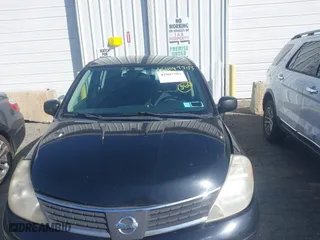 2009 Nissan Versa 1.8 S with VIN 3N1BC13E79L413789, listed as a IAAI auction lot 41887703 with 80,474 mi miles. Bid and sale history available at carsss.com. Image 6.