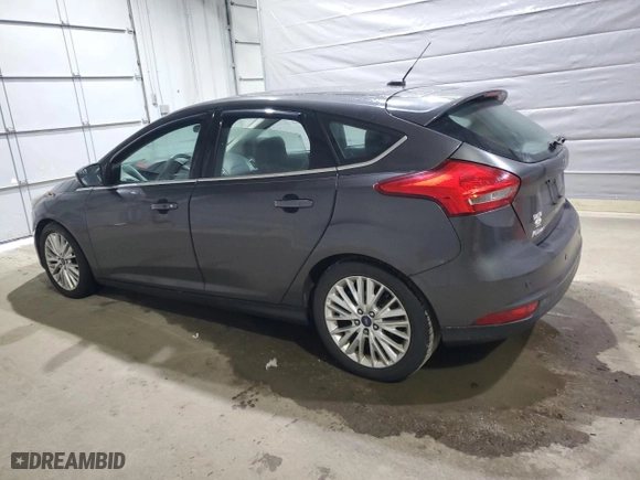 2015 Ford Focus Titanium with VIN 1FADP3N2XFL321128, listed as a Copart auction lot 50796845 with 156,700 mi miles and Clean Title. Bid and sale history available at carsss.com. Image 2.