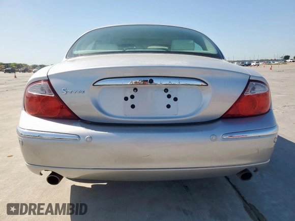 2003 Jaguar S-Type with VIN SAJEA01T43FM62477, listed as a Copart auction lot 52693085 with 109,761 mi miles and Salvage Title. Bid and sale history available at DreamBid. Image 6.