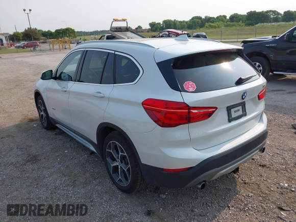 2017 BMW X1 xDrive28i with VIN WBXHT3C39H5F84338, listed as a IAAI auction lot 42400168 with 48,673 mi miles and . Bid and sale history available at DreamBid. Image 3.