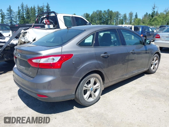 2013 Ford Focus SE z VIN 1FADP3F26DL266821, wystawiony jako IAAI lot #42677519 z przebiegiem 155 238 mil mil oraz . Historia ofert i sprzedaży dostępna na DreamBid. Obrazek 4.
