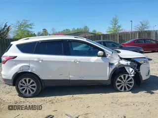 2017 Ford Escape Titanium with VIN 1FMCU9J96HUE21191, listed as a IAAI auction lot 42006013 with 71,786 mi miles. Bid and sale history available at carsss.com. Image 13.