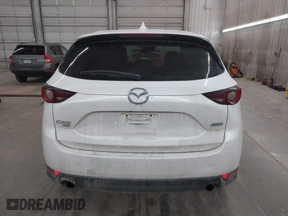 2017 Mazda CX-5 Touring with VIN JM3KFBCL9H0107589, listed as a IAAI auction lot 41241481 with 77,032 mi miles. Bid and sale history available at carsss.com. Image 16.