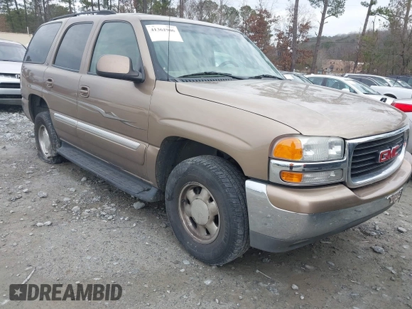 2003 GMC Yukon SLT with VIN 1GKEC13T73R126739, listed as a IAAI auction lot 41361906 with 166,748 mi miles. Bid and sale history available at carsss.com. Image 1.