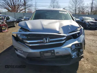 2017 Honda Pilot EX-L with VIN 5FNYF6H54HB103603, listed as a Copart auction lot 52052785 with 117,742 mi miles and Salvage Title. Bid and sale history available at DreamBid. Image 5.
