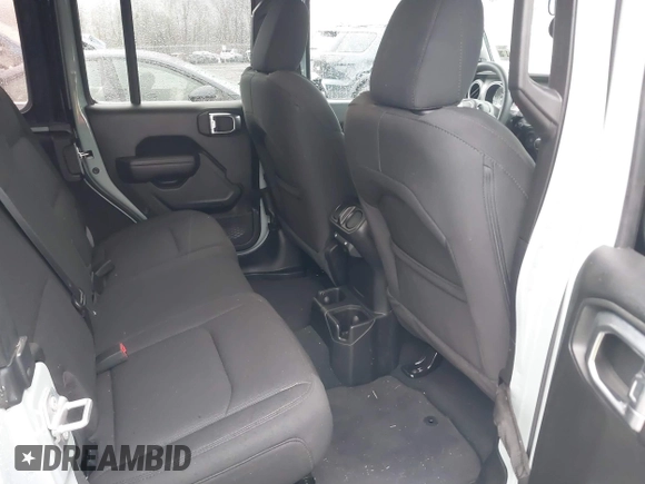 2023 Jeep Wrangler Sport S with VIN 1C4HJXDN5PW609316, listed as a IAAI auction lot 40960863 with 15,614 mi miles and . Bid and sale history available at DreamBid. Image 8.