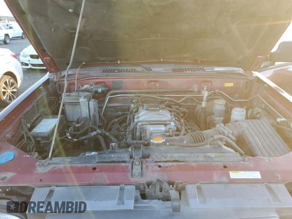 2001 Isuzu Trooper S with VIN JACDJ58X817J17877, listed as a Copart auction lot 41788875 with 203,199 mi miles and Salvage title. Bid and sale history available at DreamBid. Image 12.