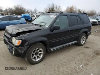2000 Infiniti QX4 with VIN JNRAR07Y3YW082661, listed as a Copart auction lot 83142034 with 246,375 mi miles and Salvage Title. Bid and sale history available at DreamBid. Image 1.